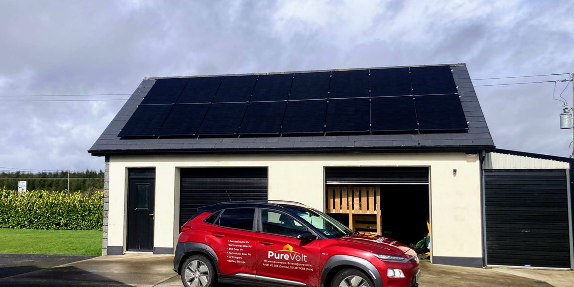 PureVolt vehicle parked outside an Irish home with solar panels on the roof